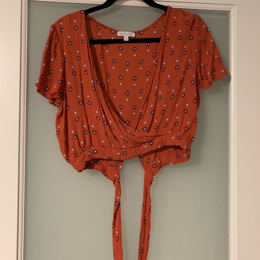 Orange flowered loose crop top